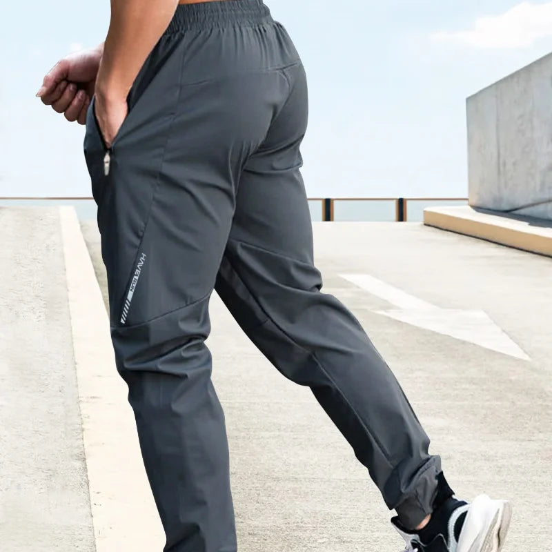 Pantalon de sport homme – Pantalon de jogging neuf été – Vêtements homme tendance – Marque mode décontractée – Survêtement homme – Pantalon à séchage rapide – Jogging confortable