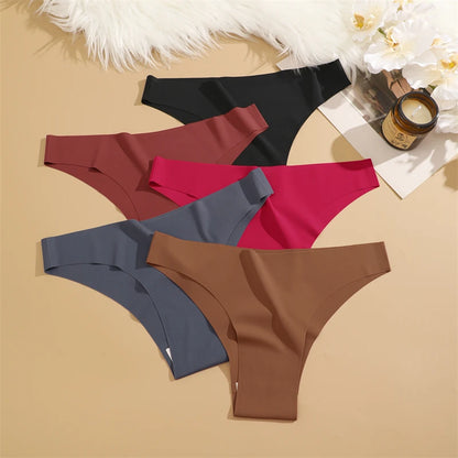 Pantalon de yoga taille haute pour femme — effet galbant, tissu respirant à pois, coupe slim courte avec poches, style évasé moderne et confortable.
